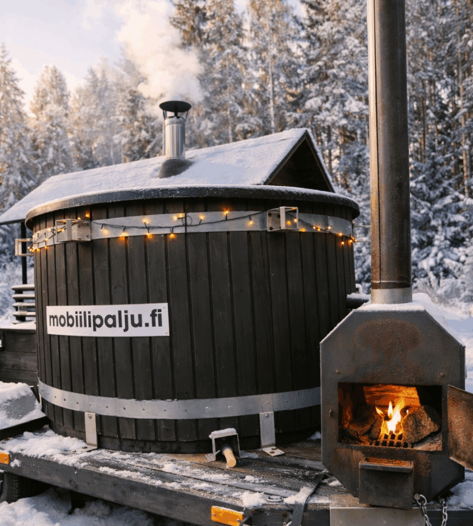 Mobiilipalju ja kamiina talvimaisemassa